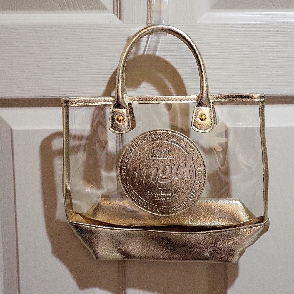 Victoria Secret women's cosmetic bag, gold color